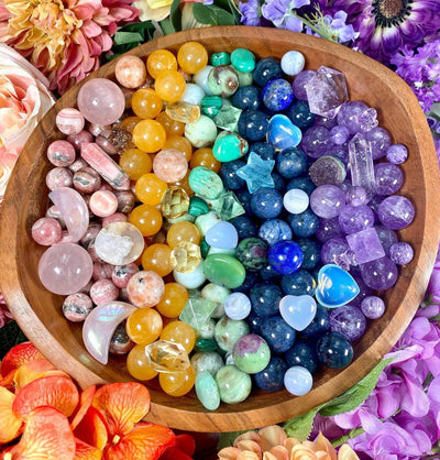 healing crystals and gemstones. pocket stone and crystals for collecting, healing, energy, and more. colorful crystal photography. high quality crystal shop crystals for affordable price. rainbow crystals spheres and carvings