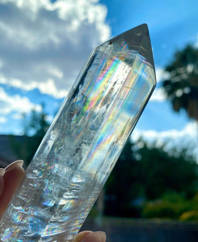 Beautiful high quality collectors statement piece crystal. optical calcite rainbows. crystal full of rainbows very vibrant rainbow colors. crystal tower, point, DT, Terminated, generator, crystal for healing and for altar space. 