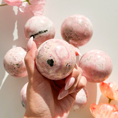 Rhodonite with Rhodochrosite Sphere